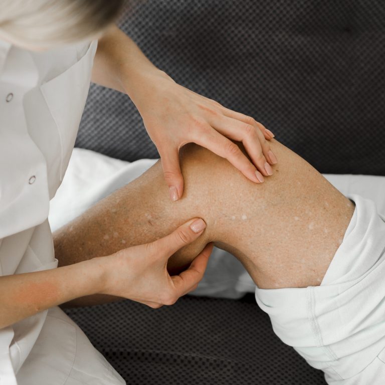 doctor-checking-patient-s-leg